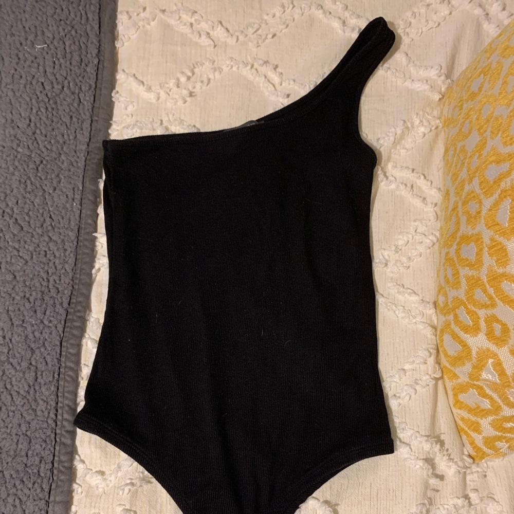Black one shoulder body suit